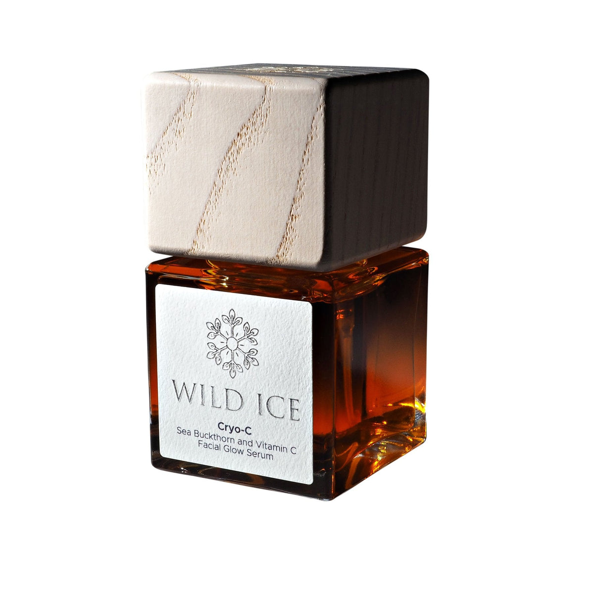 A bottle of Cryo-C vitamin C glow serum with its wood overcap on, against a plain white background