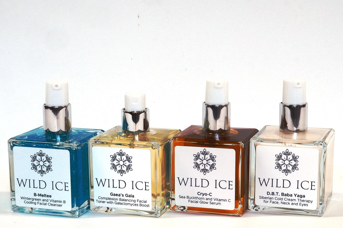 The four full-size products in the Wild Ice Essentials Routine standing in a row: B-Meltee cleanser, Gaea's Gala toner, Cryo-C vitamin C serum, and D.B.T. Baba Yaga face cream