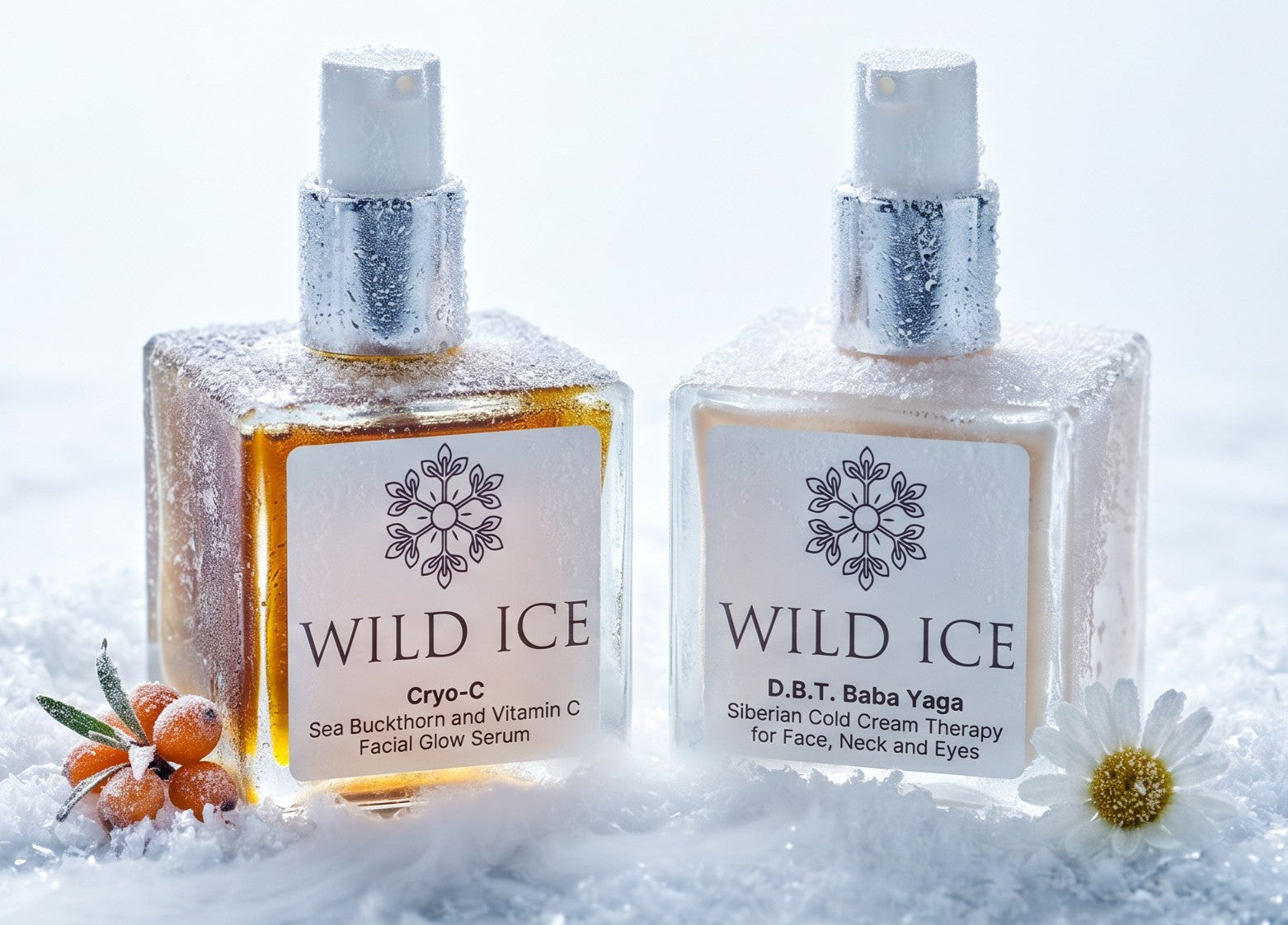 Two Wild Ice skincare bottles, Cryo-C Sea Buckthorn and Vitamin C Facial Glow Serum and Siberian Gold Cream Therapy for Face, Neck and Eyes, styled in a snowy, icy setting with small berries and a daisy.
