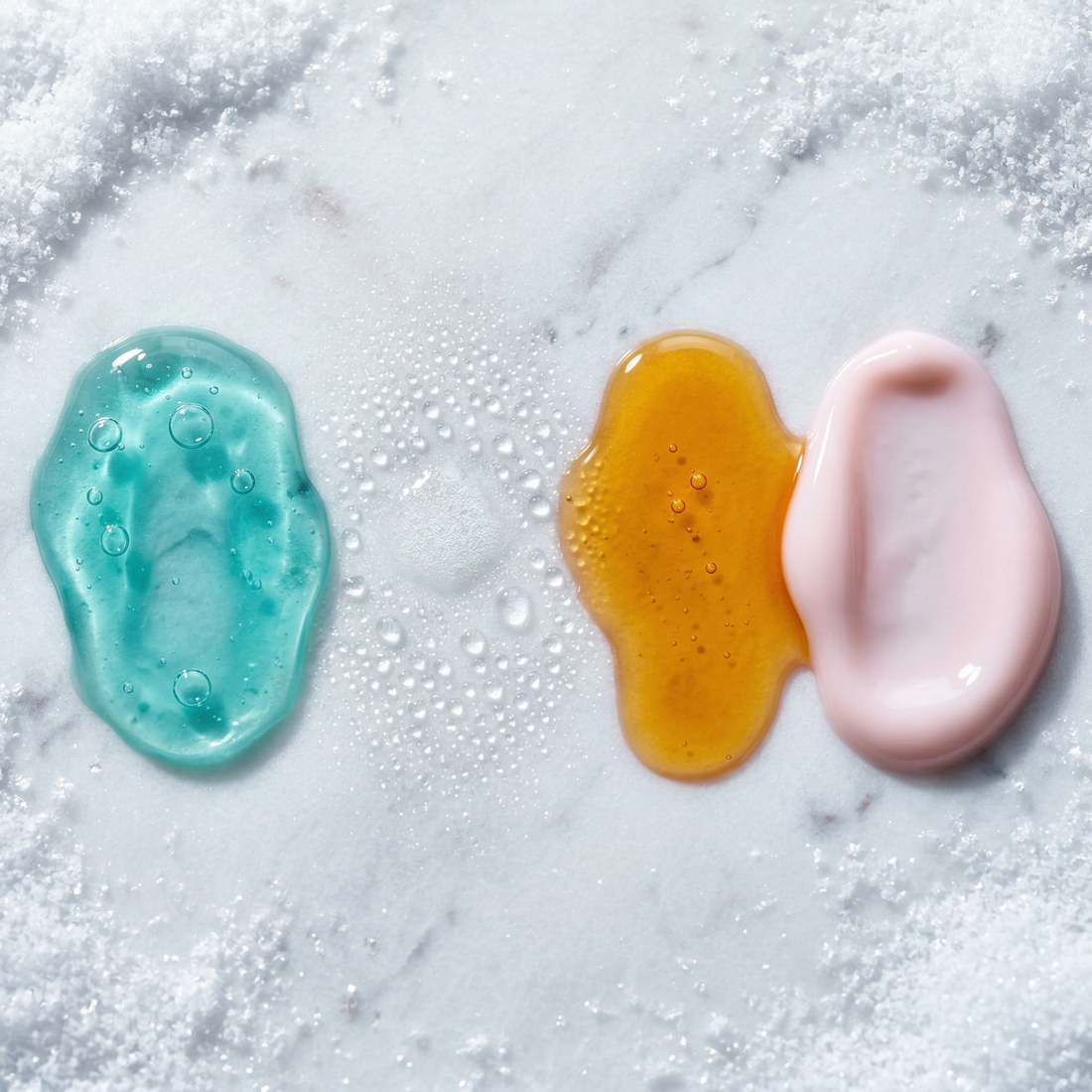 The four Essentials Routine textures swatched on marble