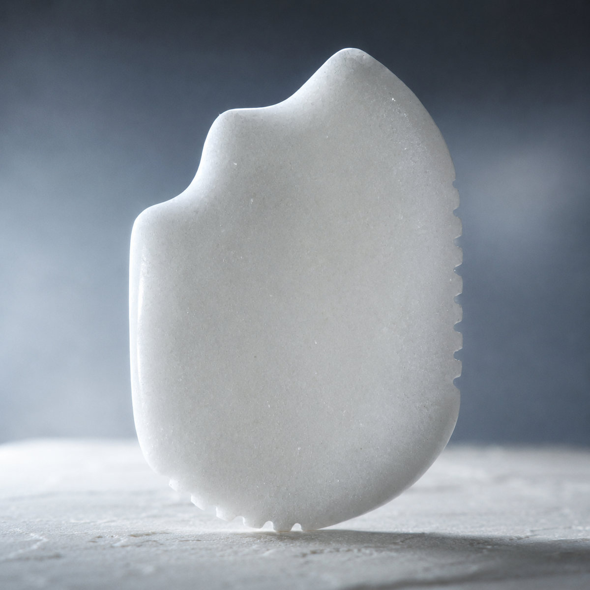 Mammoth's Tooth: Gua Sha for Deeper Absorption & Lymphatic Drainage, cold-preserved skincare by Wild Ice Botanicals