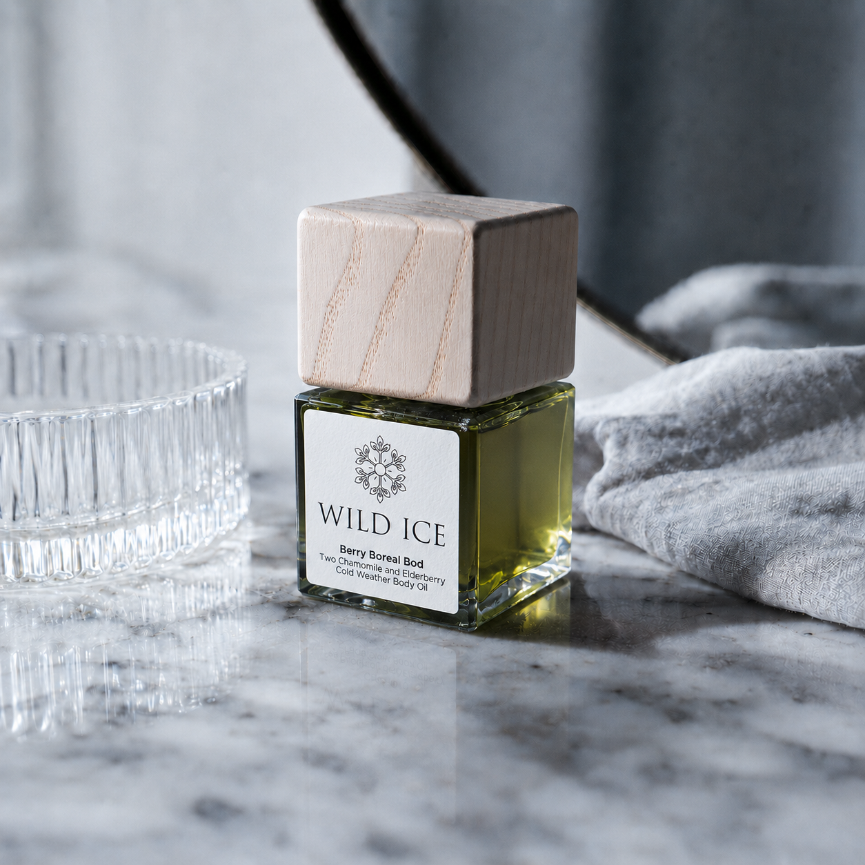 Berry Boreal Bod: Blue Tansy & Elderberry Body Oil, cold-preserved skincare by Wild Ice Botanicals, on a vanity