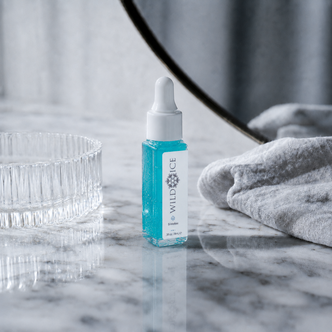Mini B-Meltee: Cooling Niacinamide Cleanser, cold-preserved skincare by Wild Ice Botanicals, on a vanity
