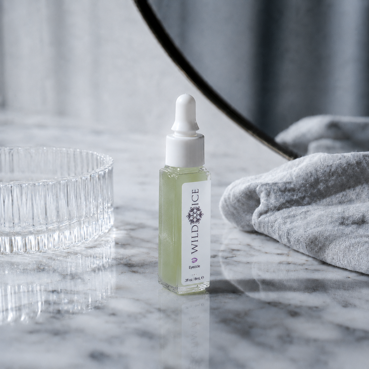 Eyecicle: Peptide Eye Serum, cold-preserved skincare by Wild Ice Botanicals, on a vanity