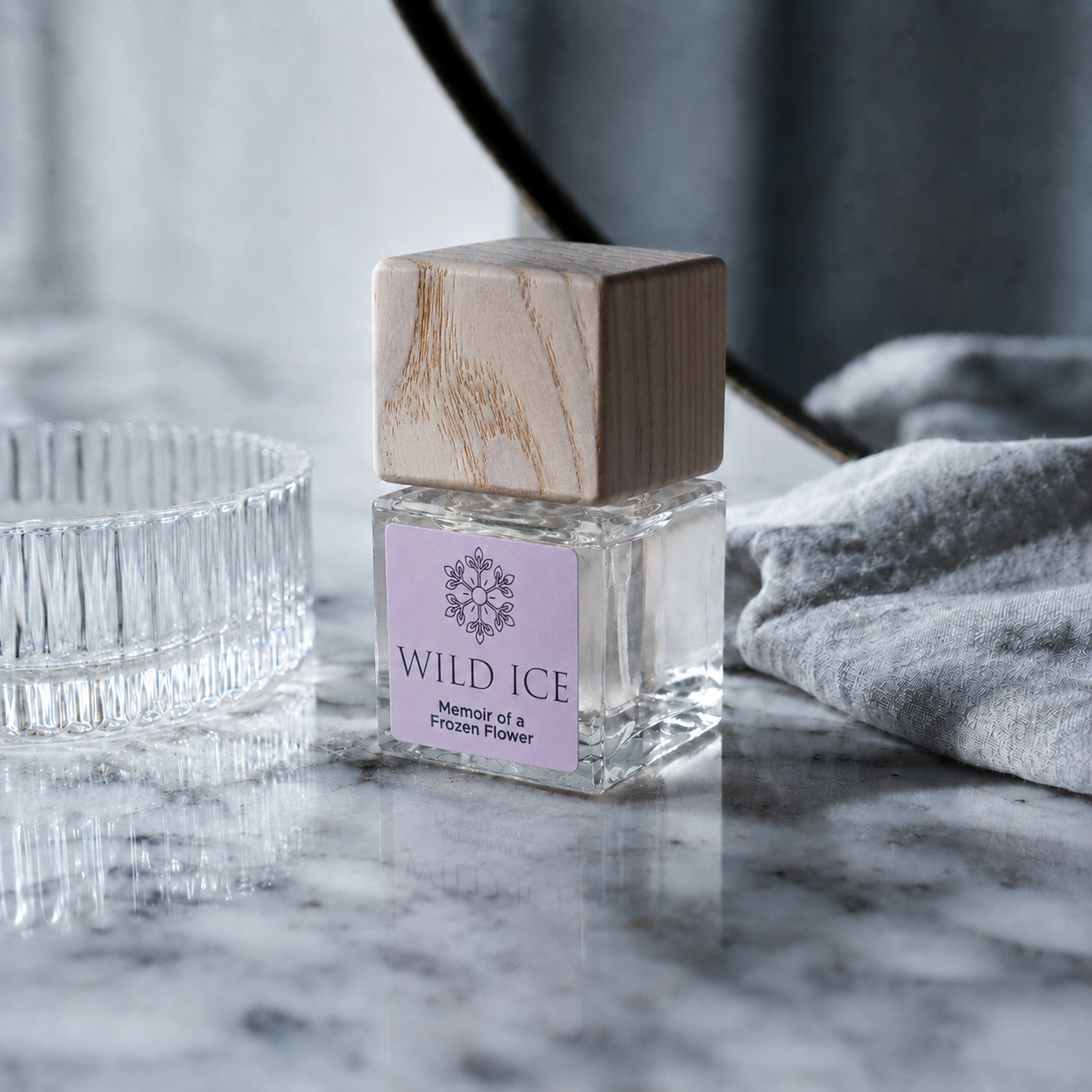 Memoir of a Frozen Flower: Clean Perfume, Parfum Strength, cold-preserved skincare by Wild Ice Botanicals, on a vanity