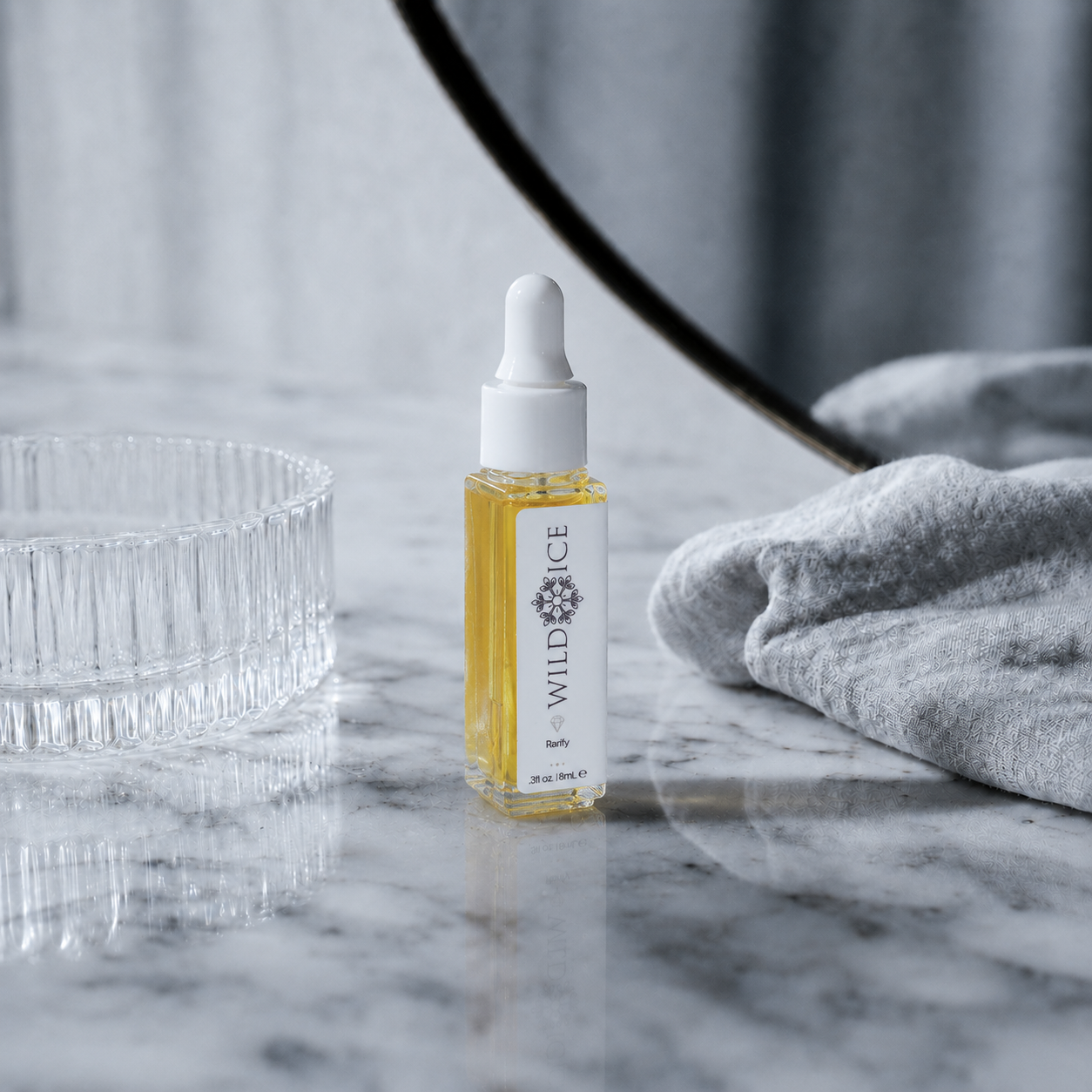 Rarify: cold-preserved botanical concentrate for blemish-prone skin, on a vanity