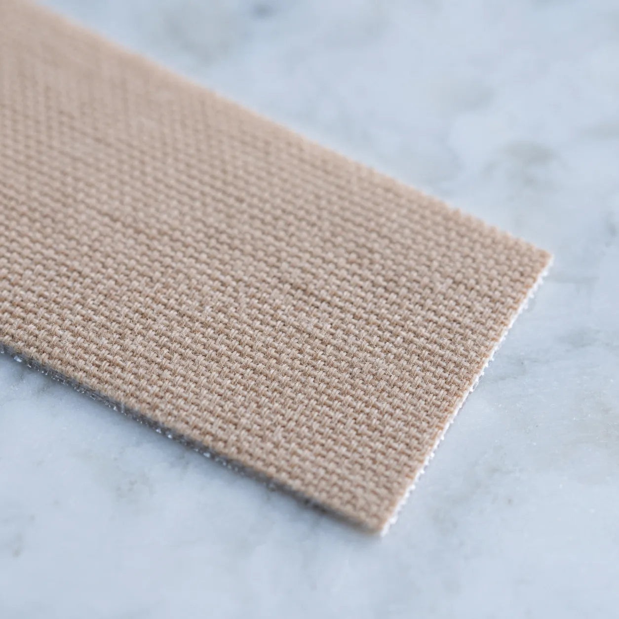 Cotton weave + adhesive-edge macro